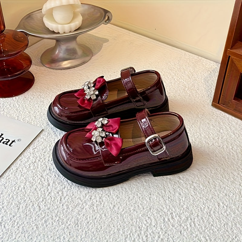 حذاء أنيق بفيونكة مرصعة وألوان لامعة للبنات