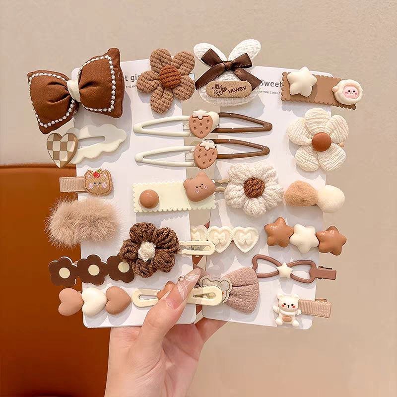 مشابك شعر للأطفال بتصاميم مزينة وزهور وأشكال لطيفة