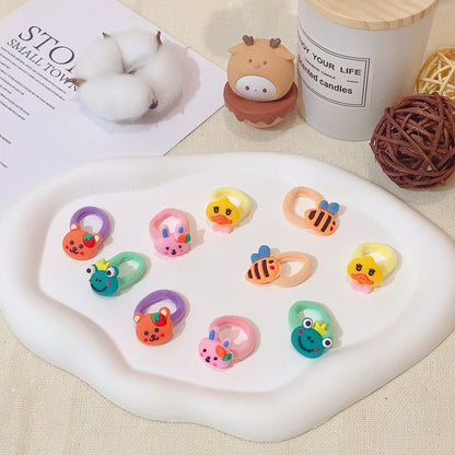 Bolsa de 100 gomas para el pelo con dibujos animados.