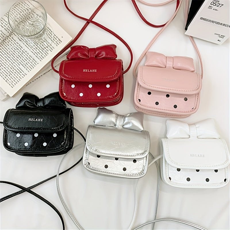 حقائب صغيرة بفيونكة ونقاط بولكا تصميم عصري للبنات الصغار